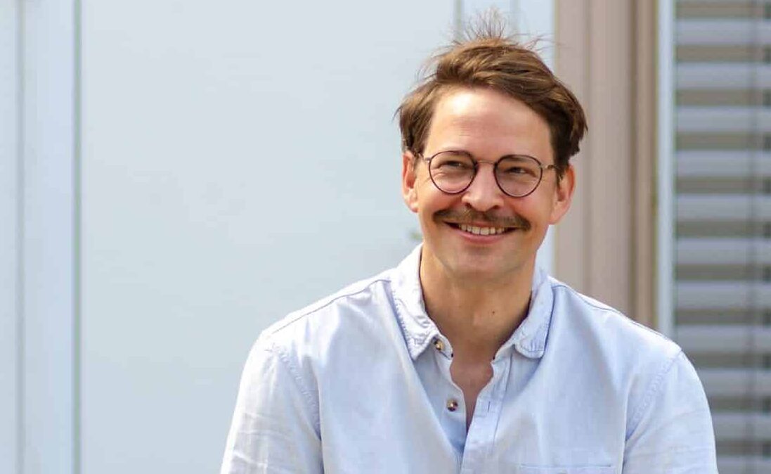 Auf dem Bild ist Michael Schmid von der AL zu sehen.